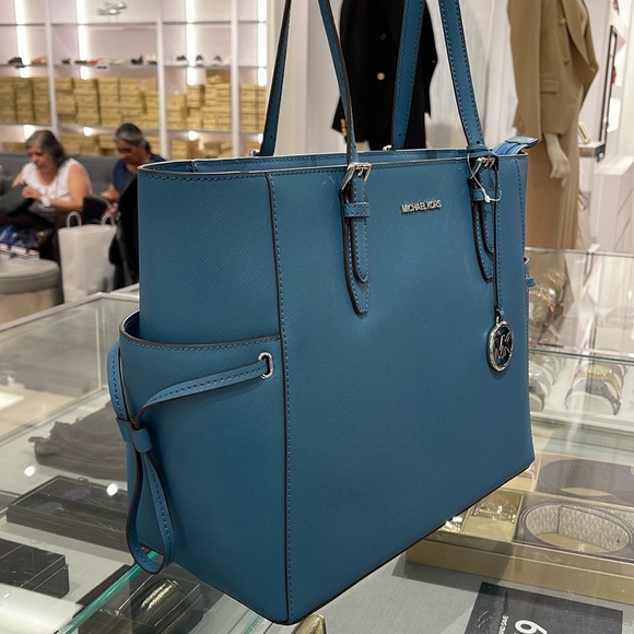 Michael Kors Gilly Large Drawstring Travel Leather Top Zip Tote
 Color: TEAL
NWT - Picture 4 of 16
